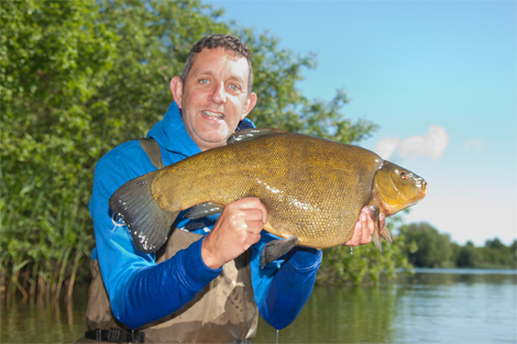 Dai Gribble is another to join the top tench list this year. His 14 lb 12 oz giant is also the biggest caught by design.