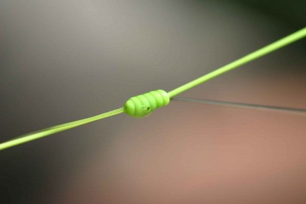 Hearing an elastic stop-knot going through the rod eyes tells me to lower my rod.