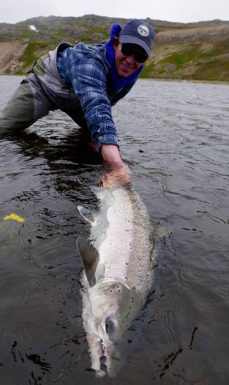 there are some pretty nifty anglers in the Farlows' stable... like Justin, seen releasing a rather large salmon!