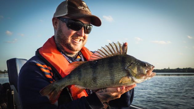 Charlie admires one of his 4 lb plus perch from Hanningfield Reservoir, where he suspected the potential was greater than realised.