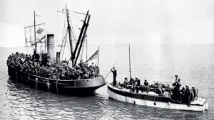 Little Ship Quisisana being towed into Dover in 1940 after recovering troops from the beaches of Dunkirk.