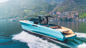 The Bellini Astor 36 in the water with mountains behind