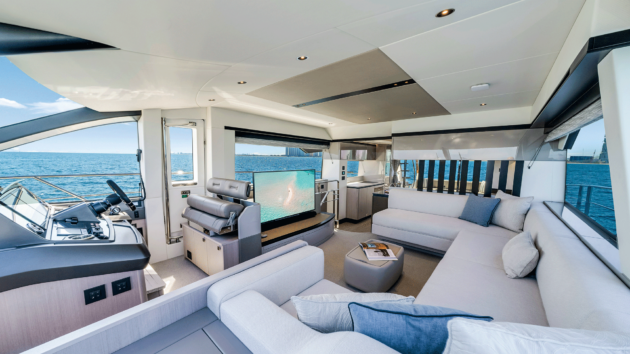 The upper saloon is subtly divided from the new full-beam aft galley