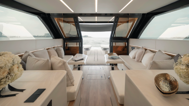 Chic saloon provides a comfortable air-conditioned respite from the open cockpit