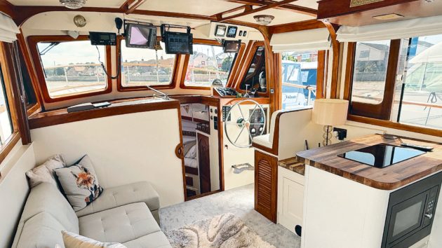 White bulkheads, ceiling panels and blinds enhance the natural light from all those doors and windows