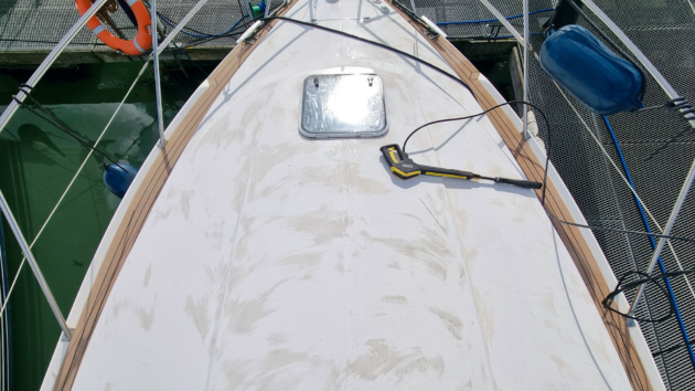 Work begins on the sun blemished decks of their bargain-priced Fairline Phantom 37