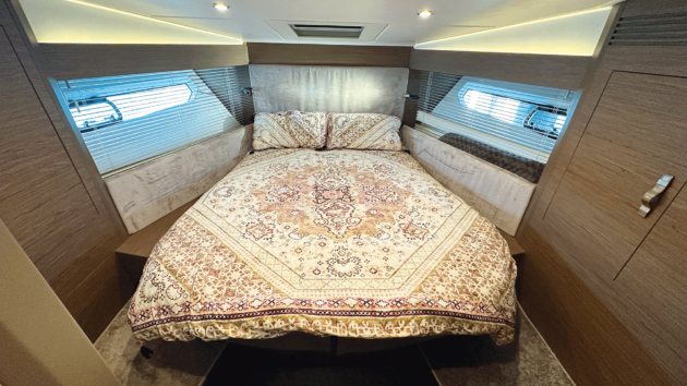 The forward guest cabin has a scissor action berth that opens up to become a V-shaped twin