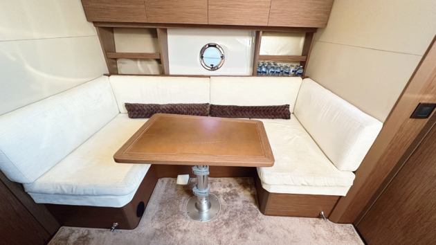 The review boat trades the optional third cabin for a lower starboard dinette
