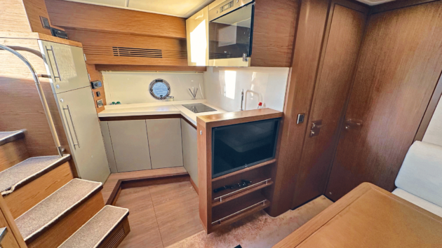 Given that there’s a wet bar up top, the lower galley is remarkably well specced