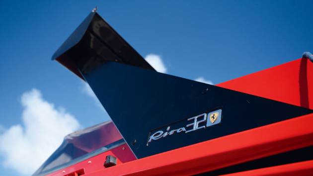 Carbon-fibre wing and two iconic badges guarantee entry to the most exclusive of marinas