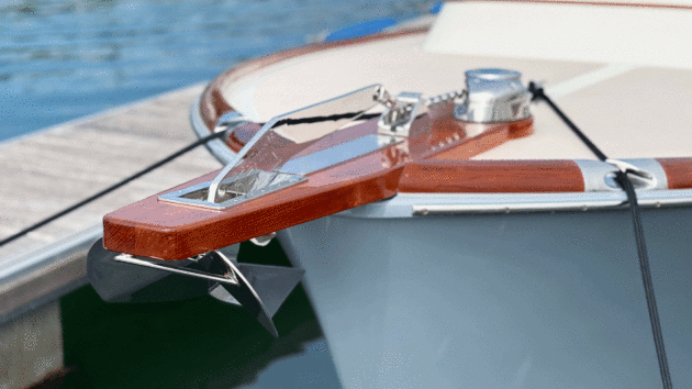 The bowsprit was custom made from teak to hold the anchor clear of the stem