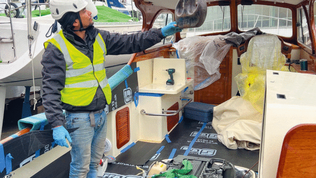 The new Yanmar 440hp is lowered into the engine bay