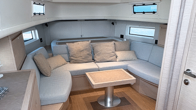 A simple hinge-over mattress converts the sofa into a double bed