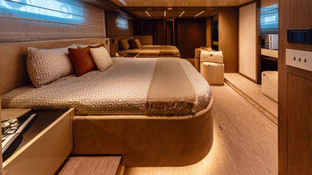 The unusual owner’s bow cabin has a bathroom in the forepeak