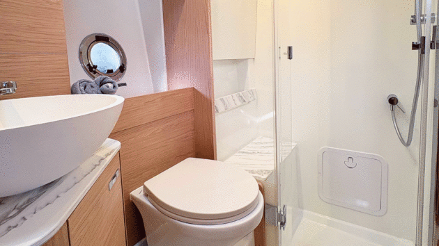 The sole bathroom can be accessed directly from the bow cabin