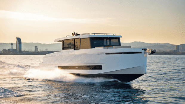 DeAntonio D60 in the water with sun behind