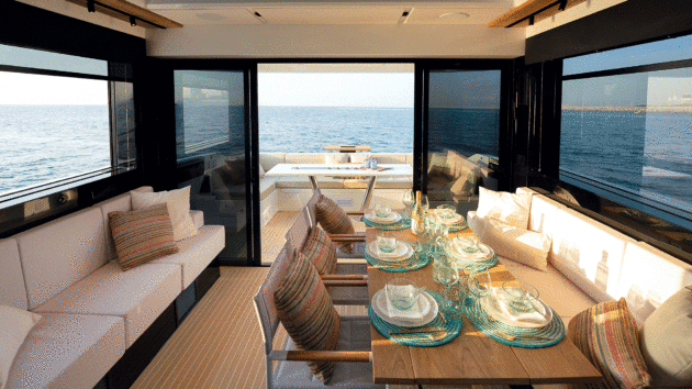 The big one-piece side windows slide down at the touch of a button