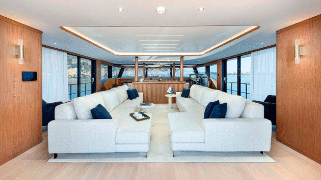 The raised saloon has sliding patio-style doors on both sides