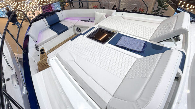 The sunken forepeak lounge is like a classical bow rider space