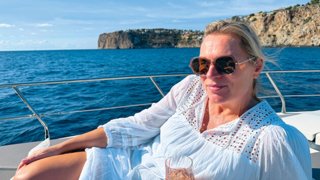Sophie relaxing on the foredeck of their new boat