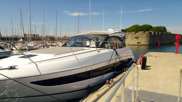Echo Beach moored in front of the old walled town of Concarneau