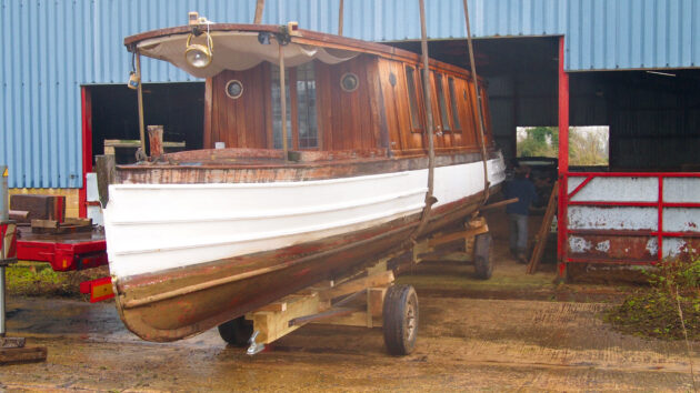 Malaya being wheeled into the cow shed in 2012