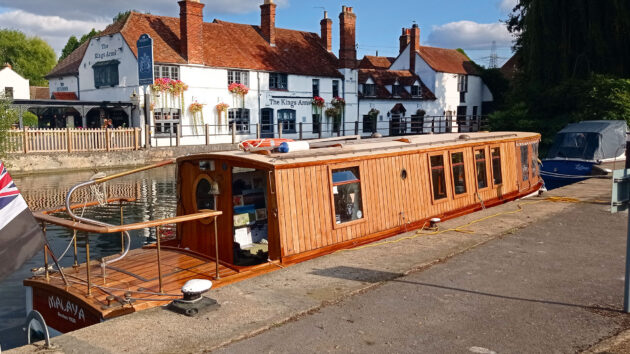 Malaya recharging her batteries outside the Kings Arms at Sandford Lock
