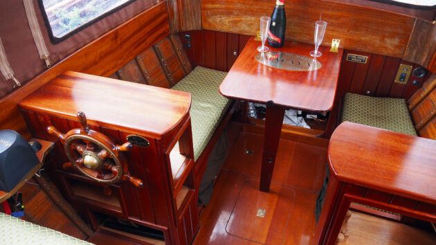 With the old diesel engine gone, the forward cockpit has been repurposed as a four-person dinette