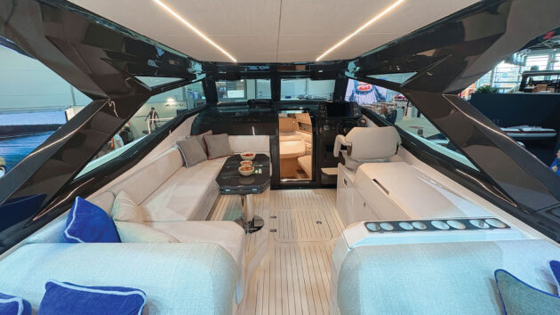 The upper cockpit runs aft to three staggered lounging units