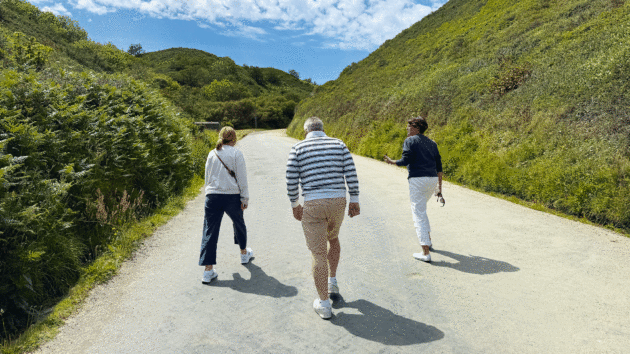 Labouring up the hill on foot