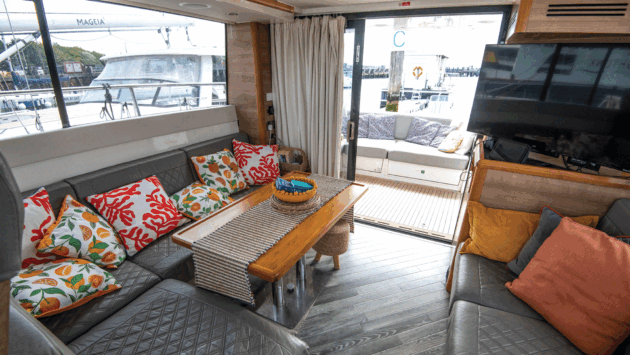 The saloon and cockpit are given over entirely to sitting, lounging and dining 
