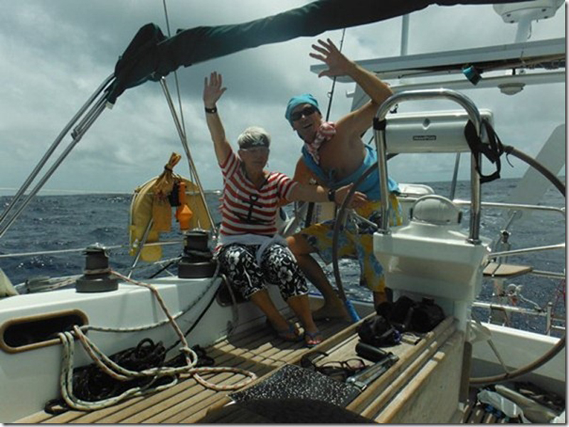 Christchurch couple Conor and Marion Wall being silly crossing the line at the end of circumnavigation