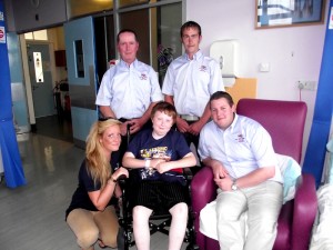 New Quay RNLI rescuers visit Ethan Read in hospital  Credit- RNLI.jpg