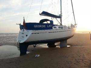 Yacht stranded at Bullverhythe off Hastings