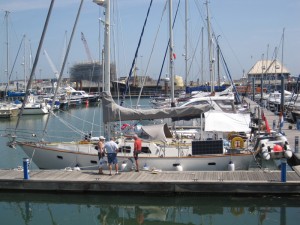 Magnetic Attraction moored at the Royal Norfolk and Suffolk Yacht Club Marinagetting ready to start their voyage.jpg