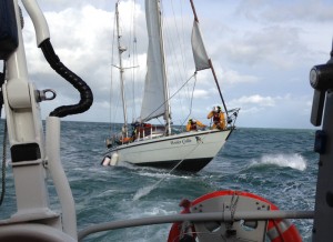 Hastings Lifeboat crew fixing a towing line. Credit: RNLI/Clive Mayhew