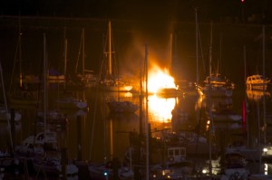 The Blue Storm on fire in Dartmouth harbour. Credit: Andy Kyle