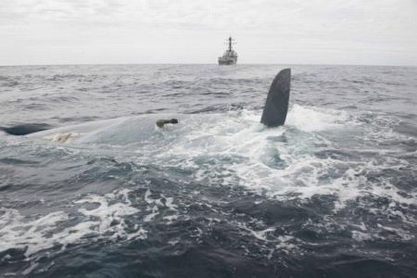 Overturned hull of Cheeki Rafiki