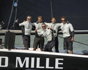Team Richard Mille celebrating their line honours victory at the 2014 Round the Island Race. Credit onEdition
