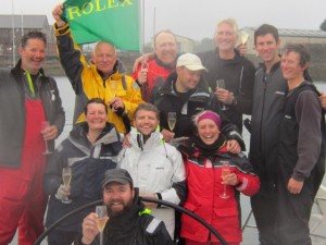 Crew of the Cheeki Rafiki at the end of the 2013 Fastnet Race. Andrew Bridge on far right; Roger Swift in yellow; Kate Dawes on the left in blue and Nicky Evans on the right in red_ Credit- Roger Swift