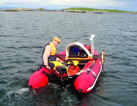 Fully loaded inflatable with farmer friend at the helm