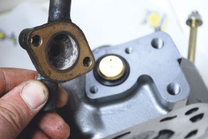 The thermostat housing is held in place by just two bolts