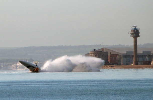The speedboat hitting the bouy while flipping in the air. Credit: Daniel Ubertini/Solent News