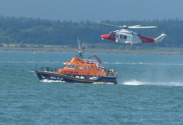 Yarmouth Lifeboat with the Search and Rescue Helicopter. Credit: RNLI/Claire Hallett