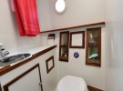 Tug Yacht 33 - The heads contains a shower which pulls out of the faucet