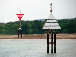 Line up leading marks to enter a harbour