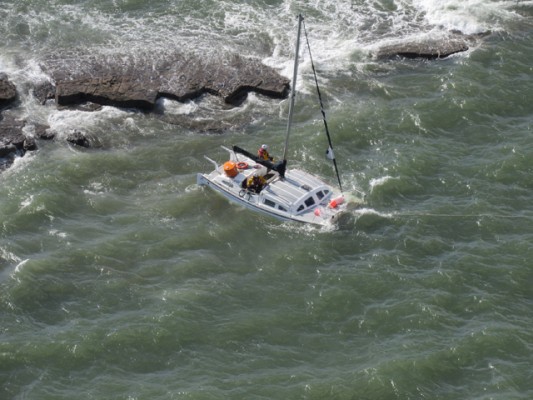 Dunmore East RNLI with sinking yacht. Credit: Rescue 117/Irish Coast Guard