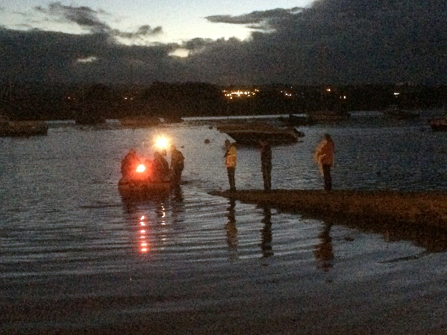 Exmouth RNLI Crew volunteers pass over the four casualties to awaiting coastguard and police teams at Topsham. Credit: Devon & Cornwall Police