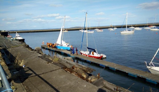 Kinghorn RNLI Lifeboat crew rescue a lone yachtsman. Credit Fisherrow Coastguard