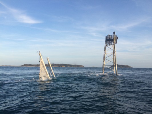 Melina of Fleet sunk at Roustel beacon, Guernsey (Herm Island in background). Credit Tom Harvey